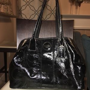 Gently used black patent leather coach bag